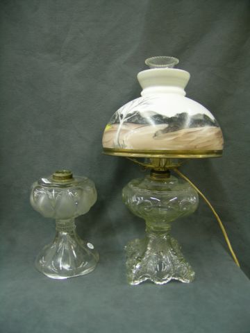 Appraisal: Two Antique Oil Lamps including clear and frosted base chip