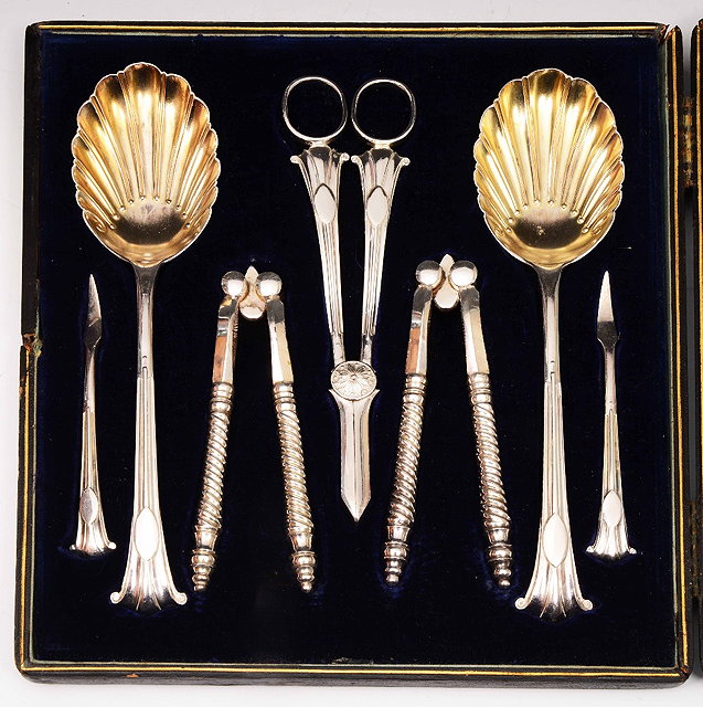 Appraisal: A silver plated setcomprising grape scissors nut crackers spoons and