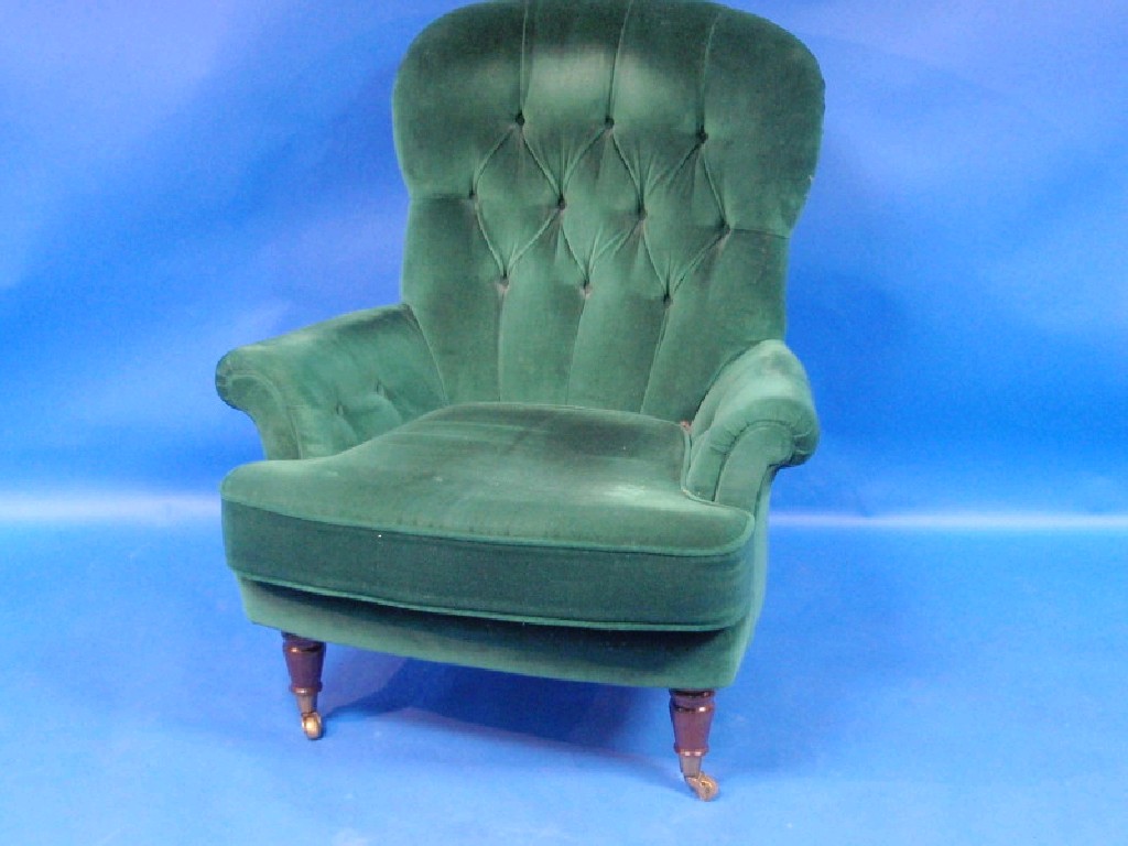 Appraisal: Button-upholstered spoon-back armchair in the Victorian manner upholstered in green