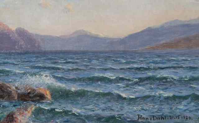 Appraisal: HANS DAHL - At the water's edge with mountains in