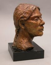 Appraisal: A Bronze Portrait Bust th Century A cast bronze head