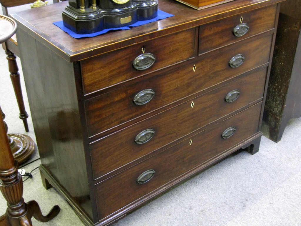 Appraisal: Georgian mahogany and crossbanded two over three chest of drawers