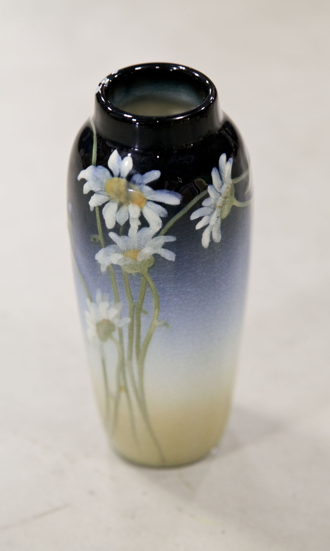 Appraisal: ROOKWOOD VASE Ohio Of tapered form with floral decorated glaze