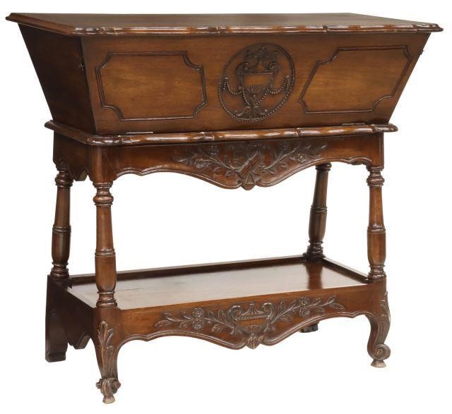 Appraisal: French Provincial walnut dough bin on stand th c drop-front