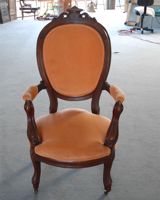 Appraisal: A th C Rococo Revival Gentleman's Chair mahogany with salmon