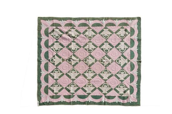 Appraisal: APPLIQUE QUILT American late th century Cherry basket swag pattern