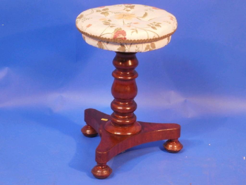 Appraisal: A thC mahogany piano stool raised on a turned column