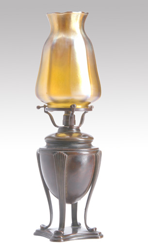 Appraisal: TIFFANY STUDIOS Boudoir lamp its gold Favrile tulip-shaped shade atop