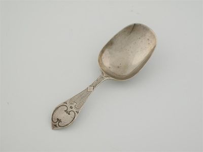 Appraisal: A Victorian spoon with rounded oblong bowl engine turned stem