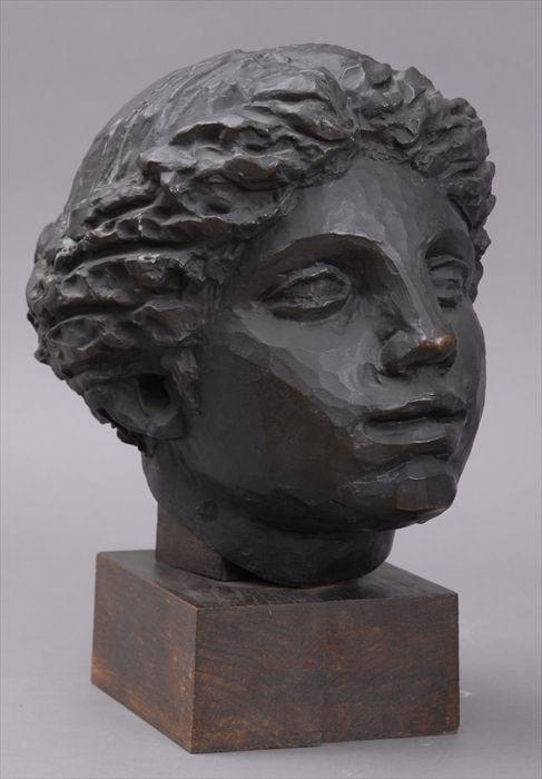 Appraisal: AFTER RODIN HEAD OF A WOMAN Cast metal sculpture on