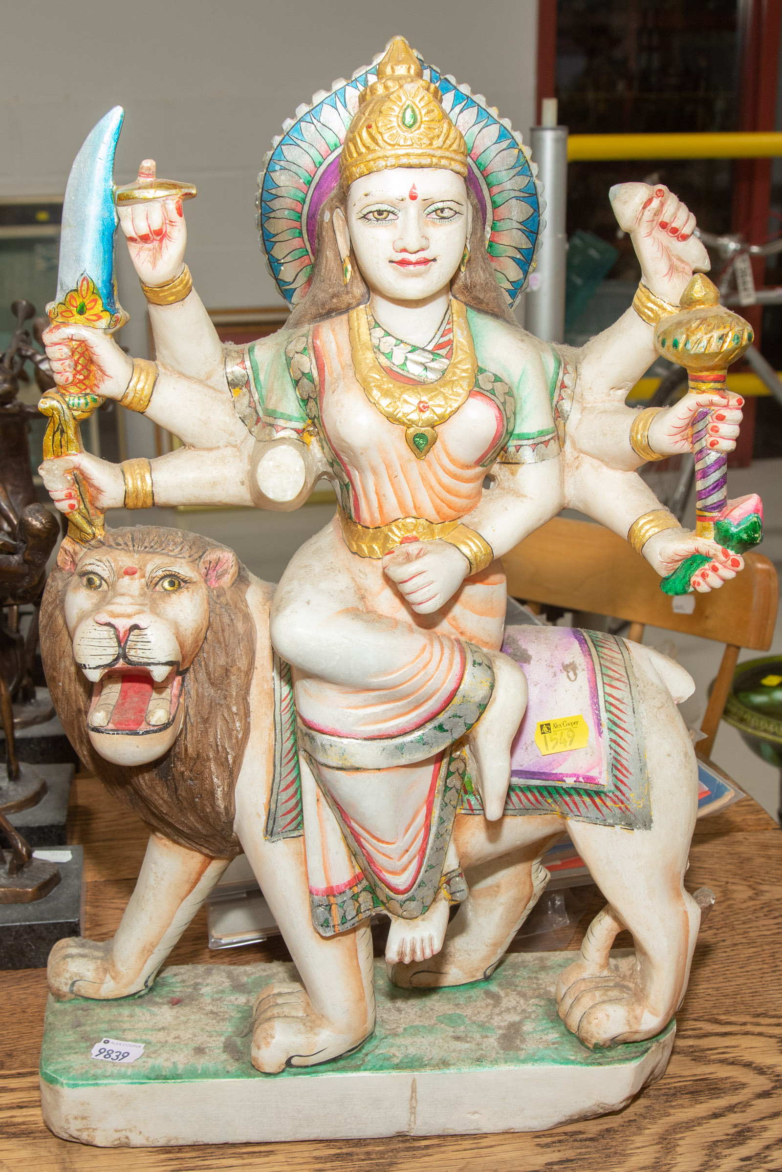 Appraisal: INDIAN ALABASTER FIGURE OF THE GODDESS DURGA RIDING ON A