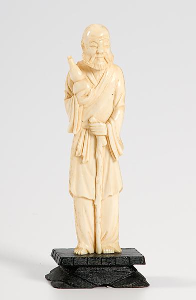 Appraisal: CARVED IVORY LOHAN FIGURE late th early th century figure