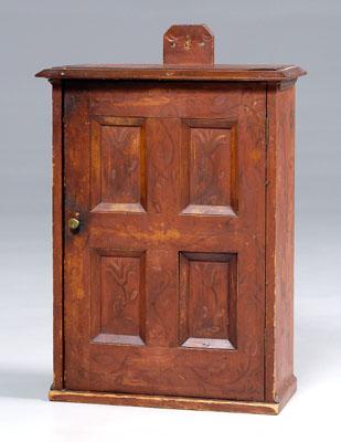 Appraisal: Paint decorated folk art cabinet chestnut and pine hanging cabinet