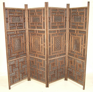 Appraisal: An Indian hardwood and brass inlaid four fold screen with