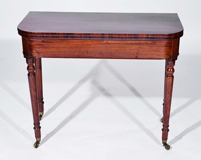 Appraisal: A TH CENTURY MAHOGANY FOLDOVER CARD TABLE with 'D' shaped