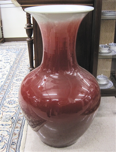 Appraisal: CHINESE SANG DE BOEUF PORCELAIN FLOOR VASE having a globular