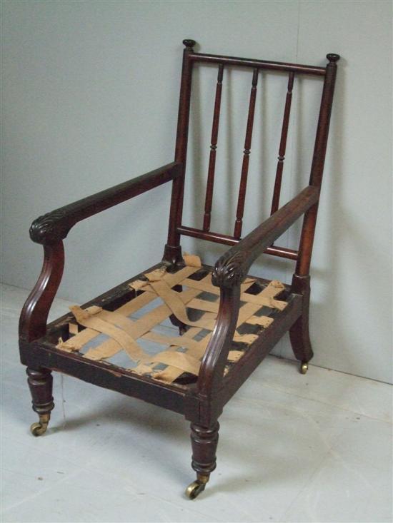 Appraisal: Early th century mahogany open armchair with spindle back and