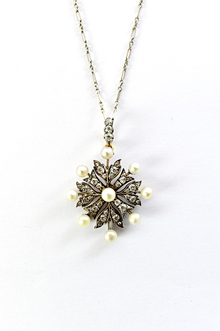 Appraisal: A Victorian diamond and cultured pearl set pendant in an