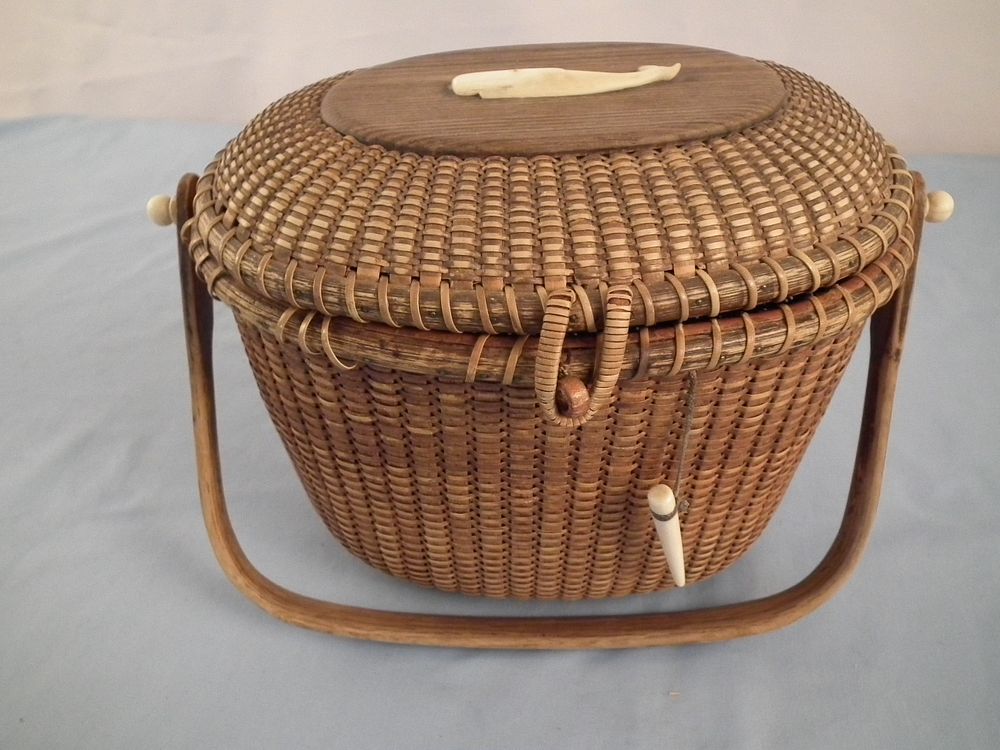 Appraisal: BOYER NANTUCKET BASKET Old Nantucket basket purse with whale plaque