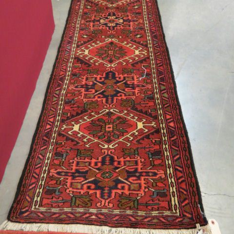 Appraisal: Heriz Persian Handmade Runner fancy geometric medallion red brown field