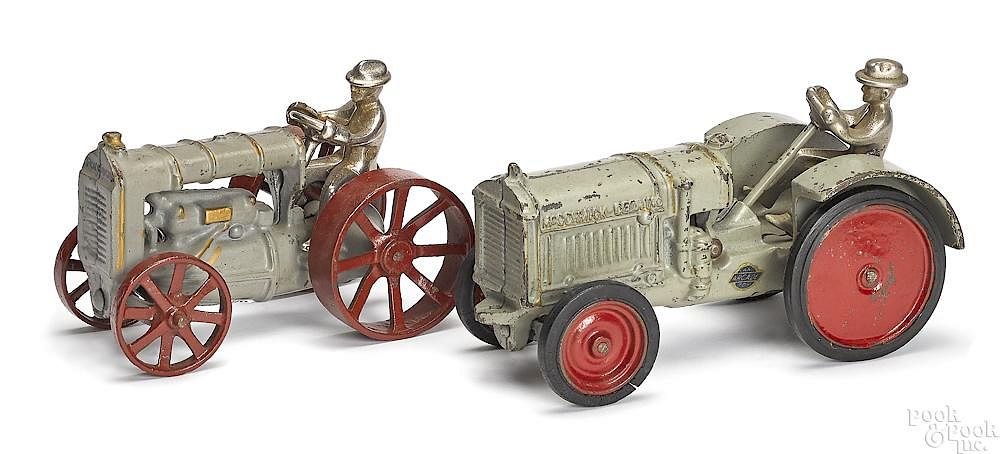 Appraisal: Two Arcade cast iron farm tractors Two Arcade cast iron