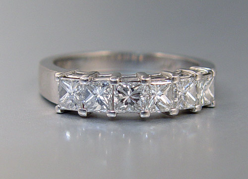 Appraisal: PLATINUM DIAMOND PRINCESS BAND RING Platinum ring contains square brilliant