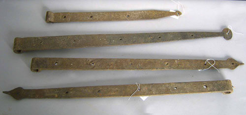 Appraisal: Four wrought iron barn door hinges th c together with