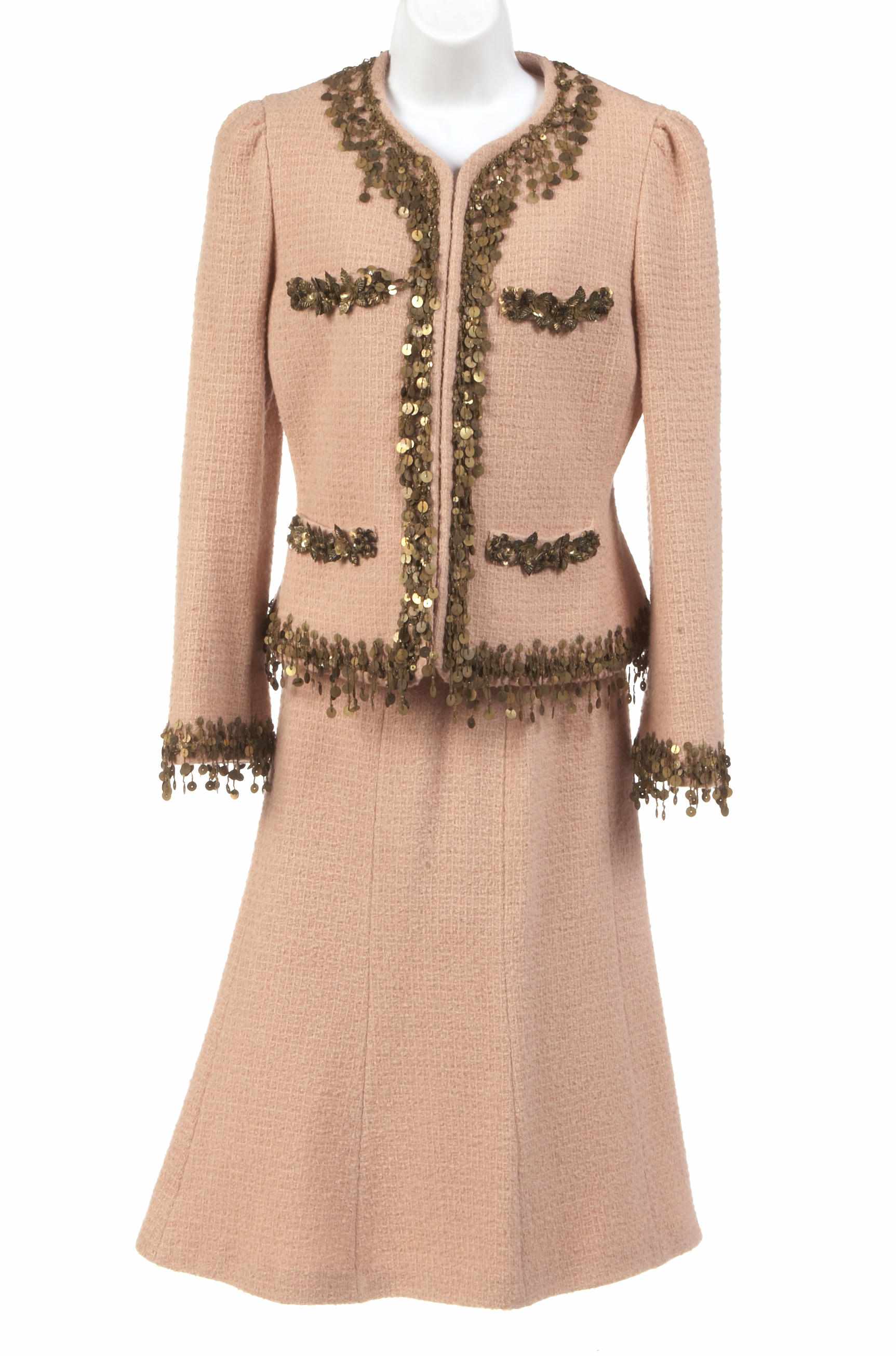 Appraisal: A Moschino peach and gold sequin trimmed wool skirt suit