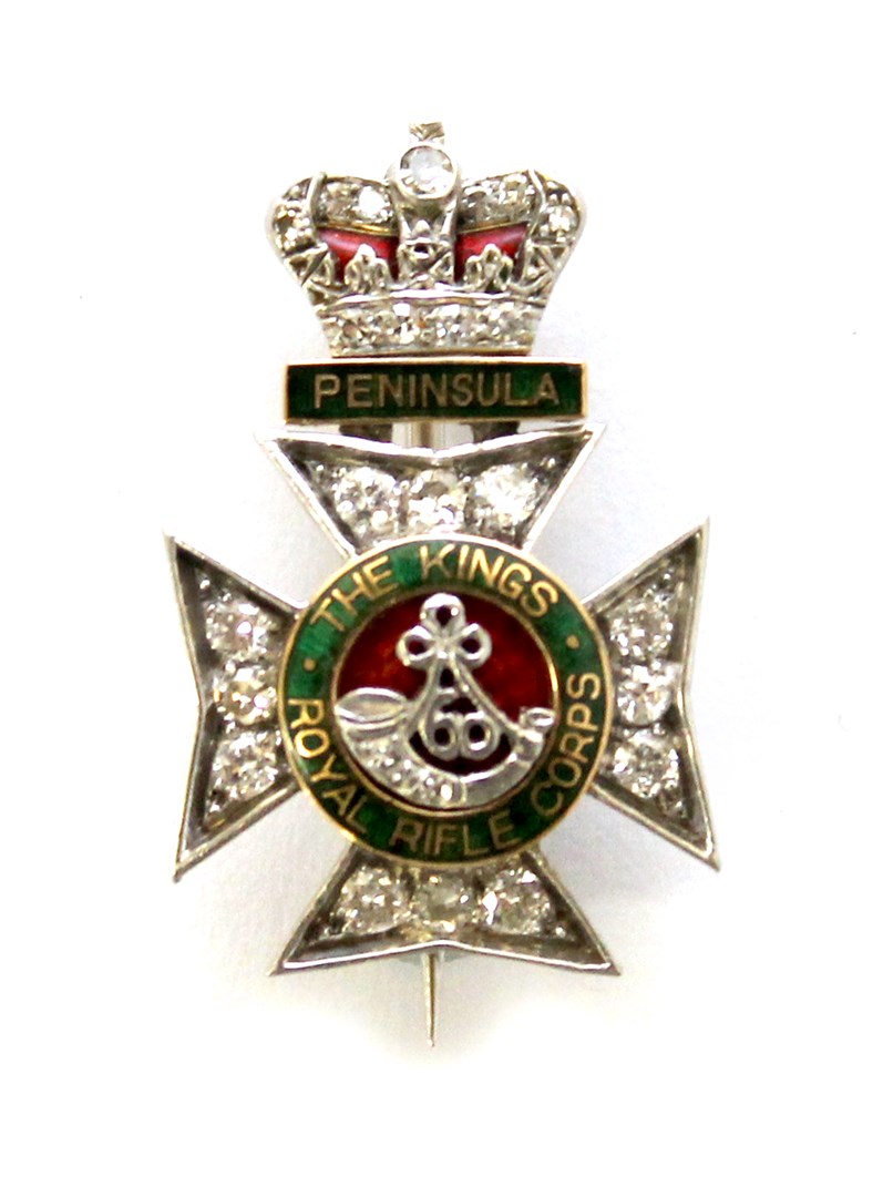 Appraisal: A diamond set and enameled military regimental sweethearts brooch designed