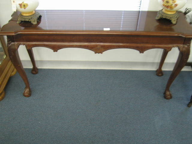 Appraisal: Sofa Table carved trim ball claw feet