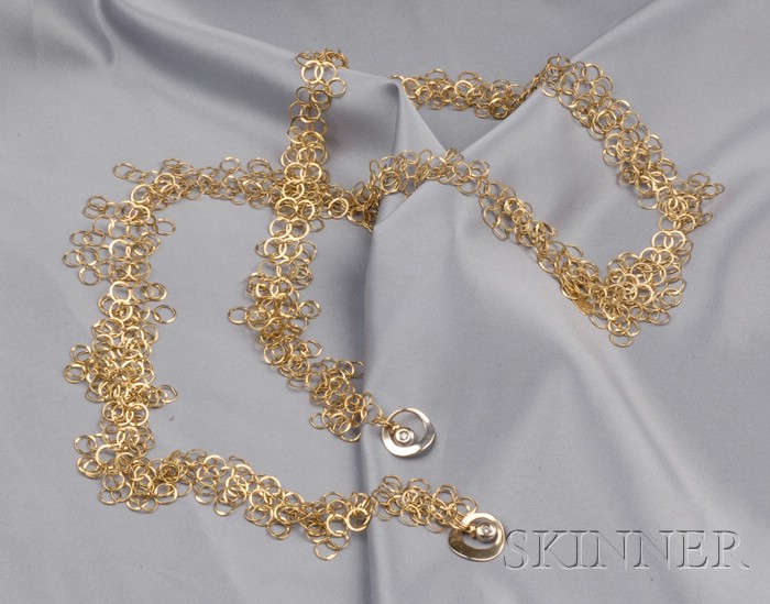 Appraisal: kt Bicolor Gold Necklace composed of interlinking delicate rings highlighted