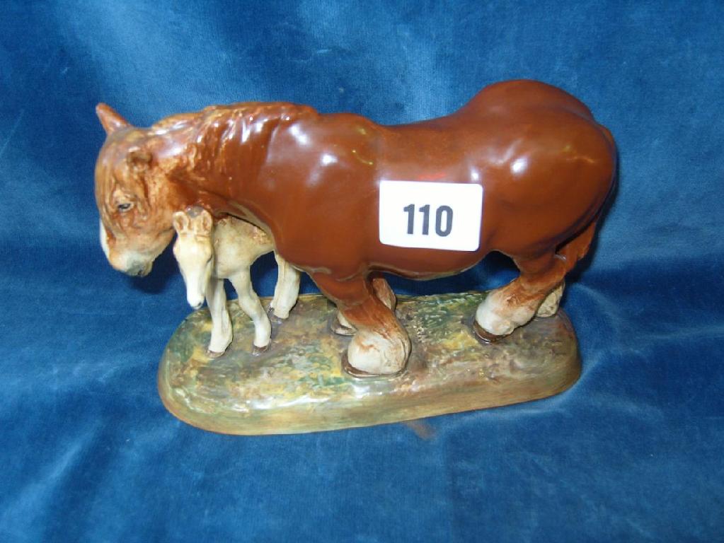 Appraisal: A Royal Doulton figure group of a brown shire mare