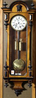 Appraisal: Austrian regulator wall clock having two weights housed in a