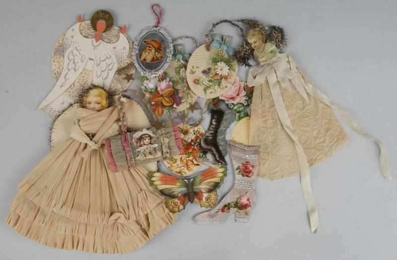 Appraisal: Lot of Paper Christmas Ornaments Description Many are ladies with