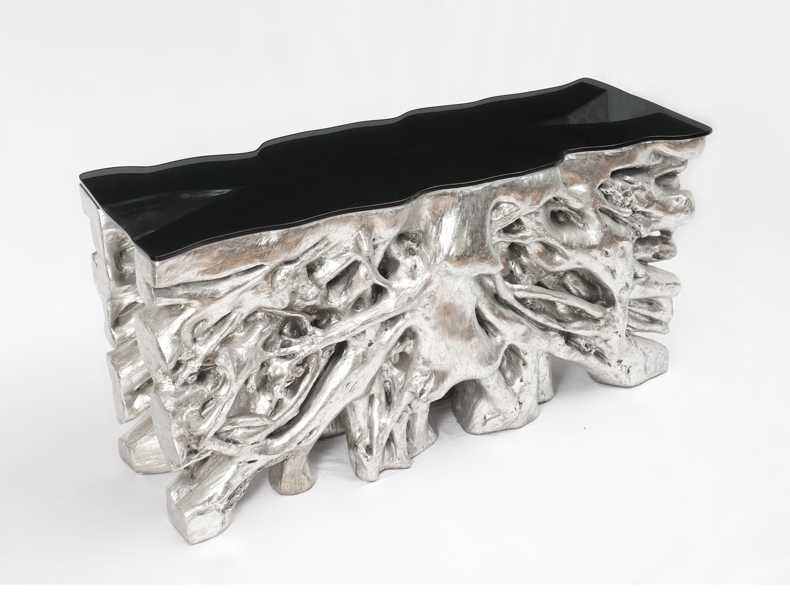 Appraisal: BRUTALIST GLASS TOP SILVER HALL TABLE Contoured smoked glass top