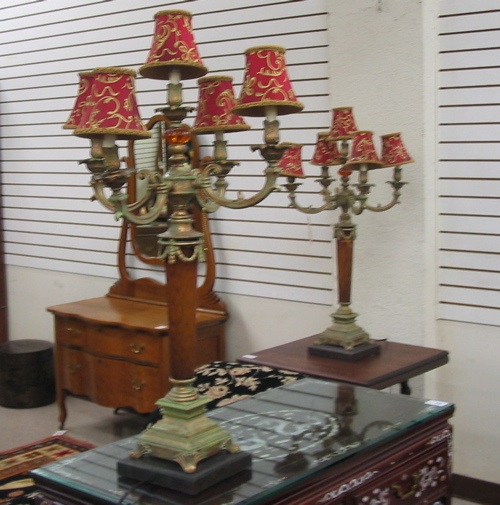 Appraisal: PAIR OF FIVE-LIGHT METAL DECORATOR LAMPS the candle lamps supporting