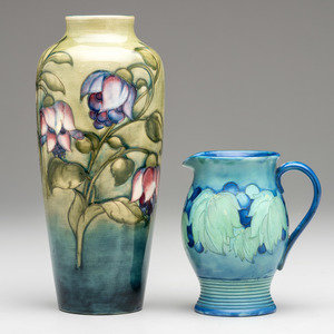 Appraisal: Moorcroft English th Century Vase and Pitcher glazed earthenware each