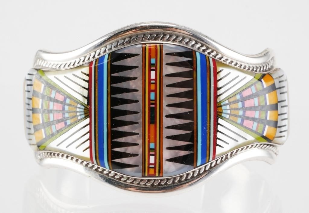 Appraisal: Sterling silver cuff bracelet featuring Native American Navajo or Zuni