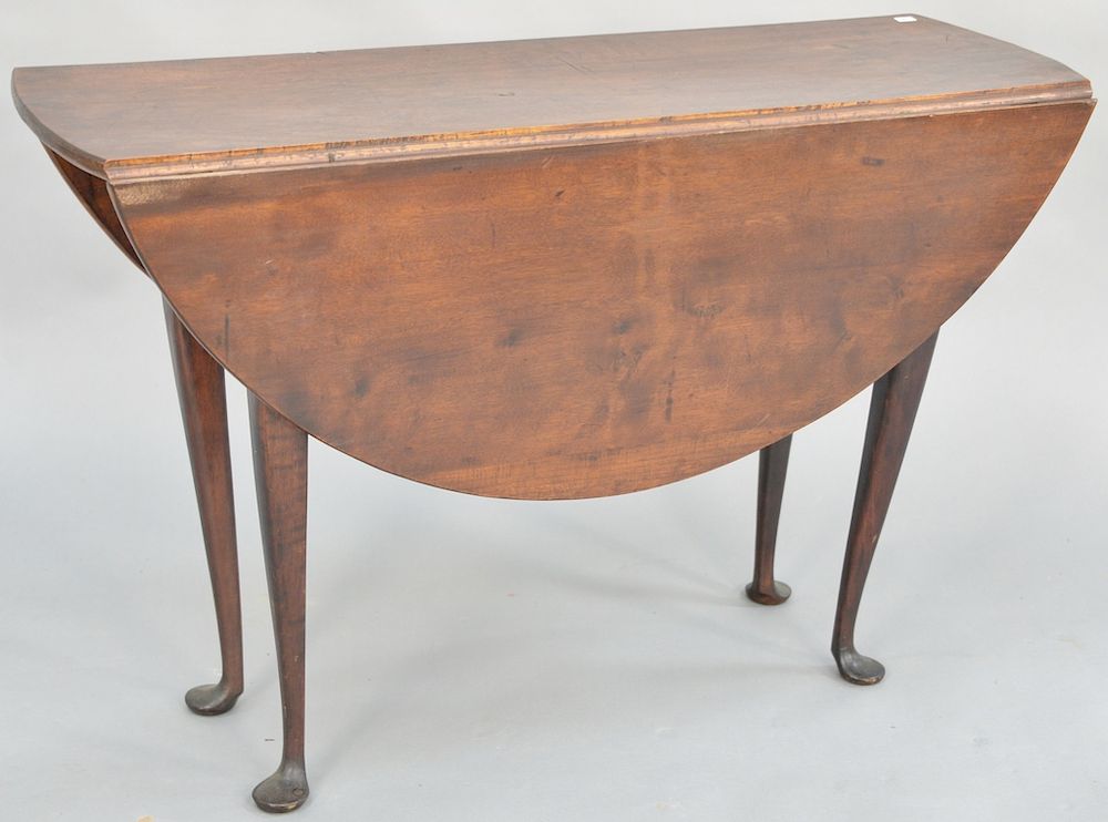 Appraisal: Queen Anne table having round drop leaves on base with