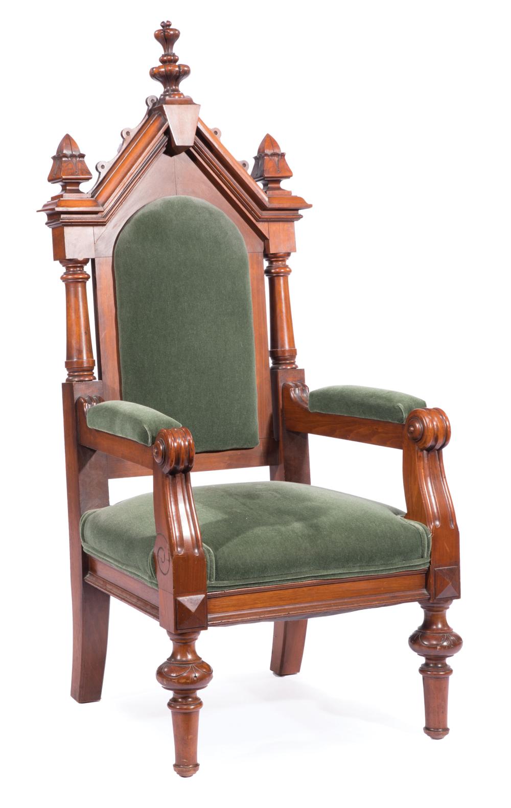 Appraisal: American Gothic Carved Walnut Armchair th c architectonic crest with