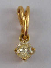 Appraisal: A yellow metal tests carat gold diamond solitaire pendant the