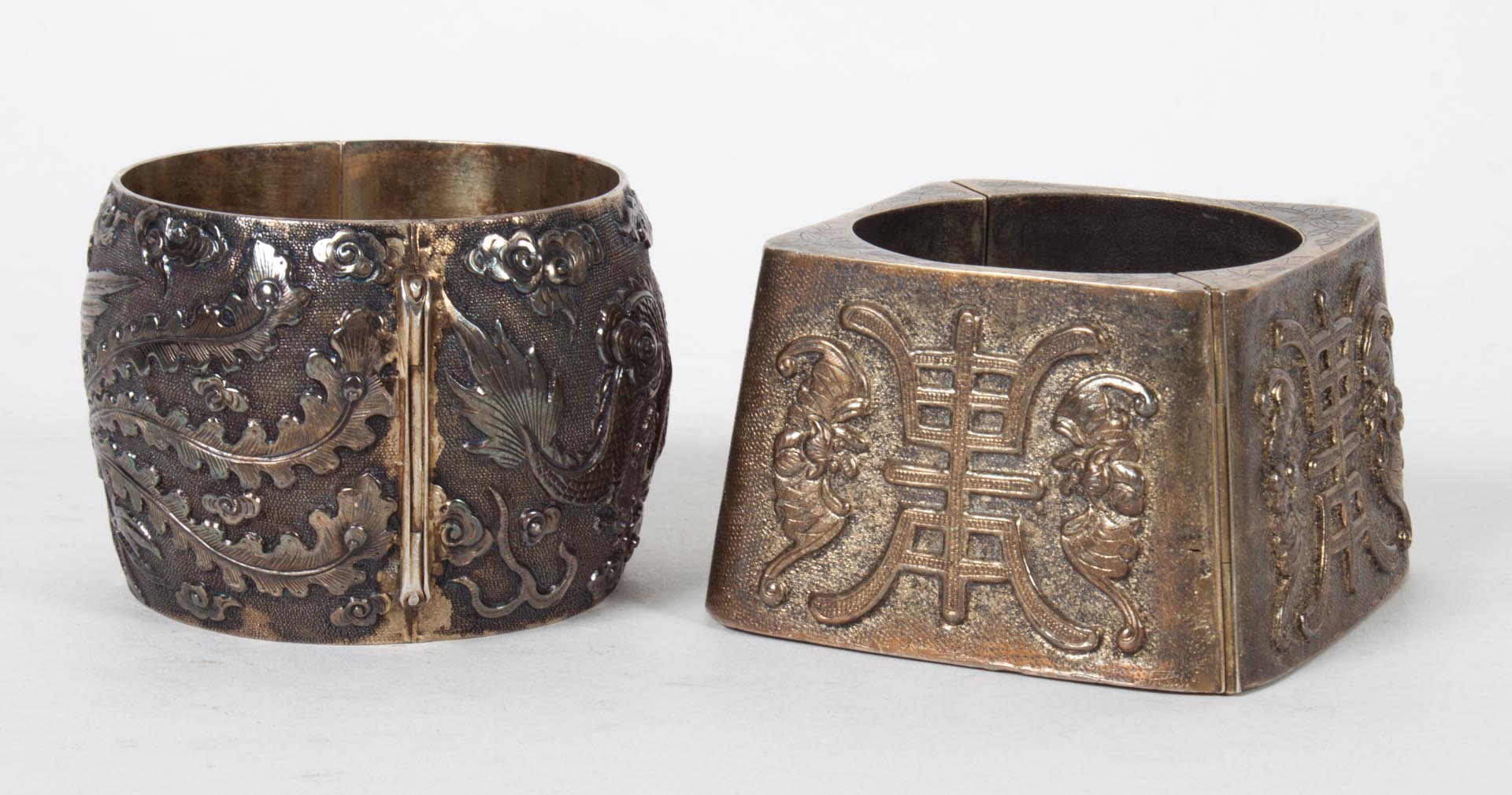 Appraisal: Two Chinese cuff bracelets gilt silver cuff bracelet and a