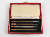 Appraisal: A boxed set of four silver Bridge pencils each marked