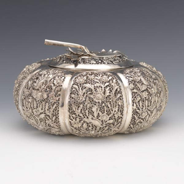 Appraisal: RETICULATED PUMPKIN BOX x Silvered metal lidded decorative box with