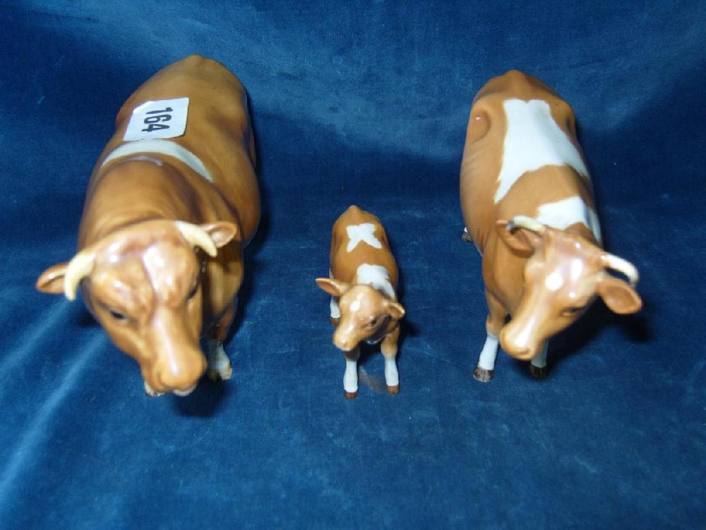 Appraisal: A family of three Beswick Guernsey cattle a bull marked