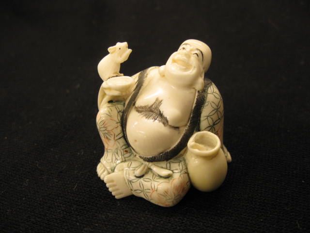 Appraisal: Carved Ivory Netsuke of Hotei god of happiness holding a