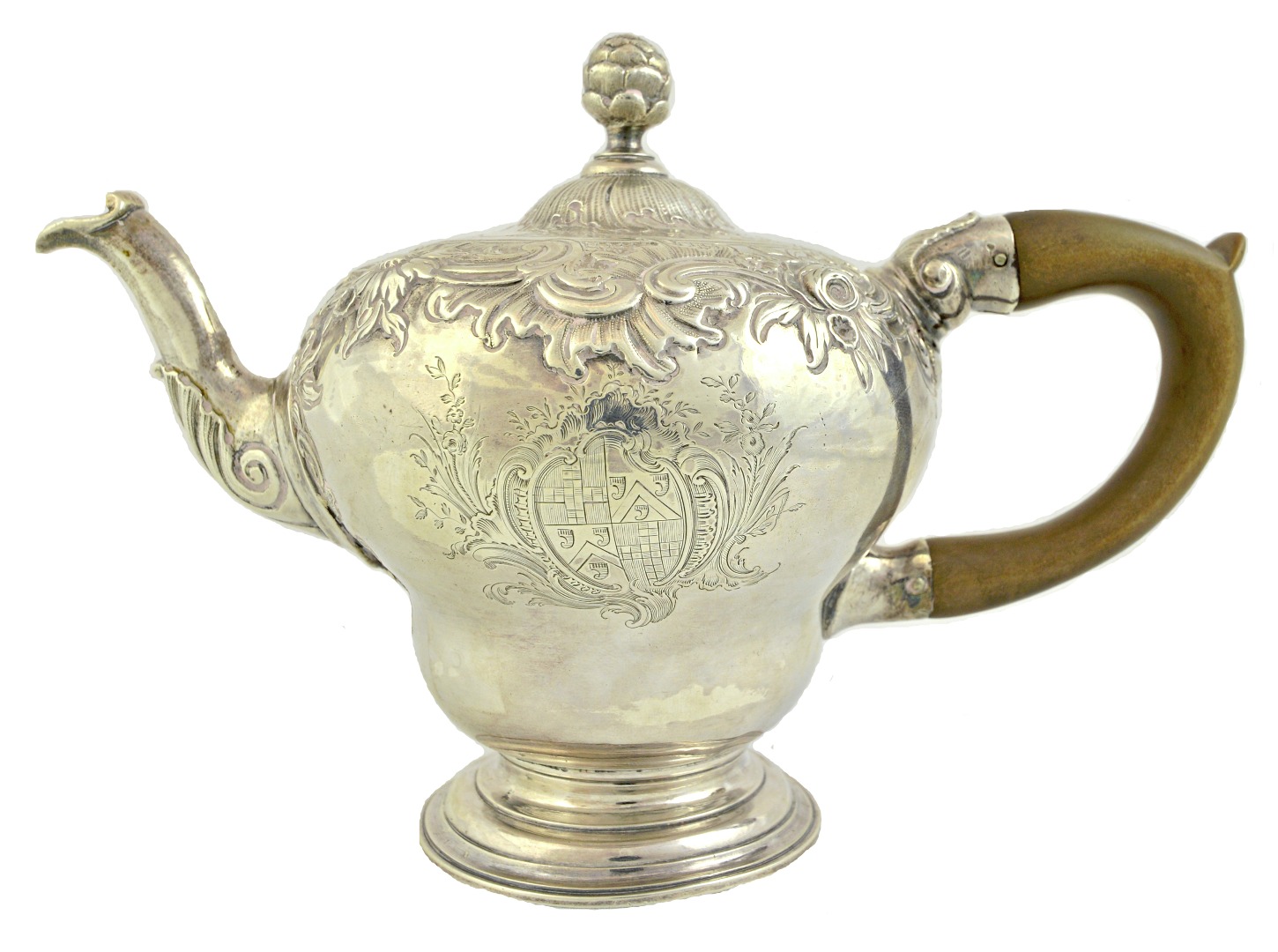 Appraisal: A George II silver teapot of inverted pear shaped form