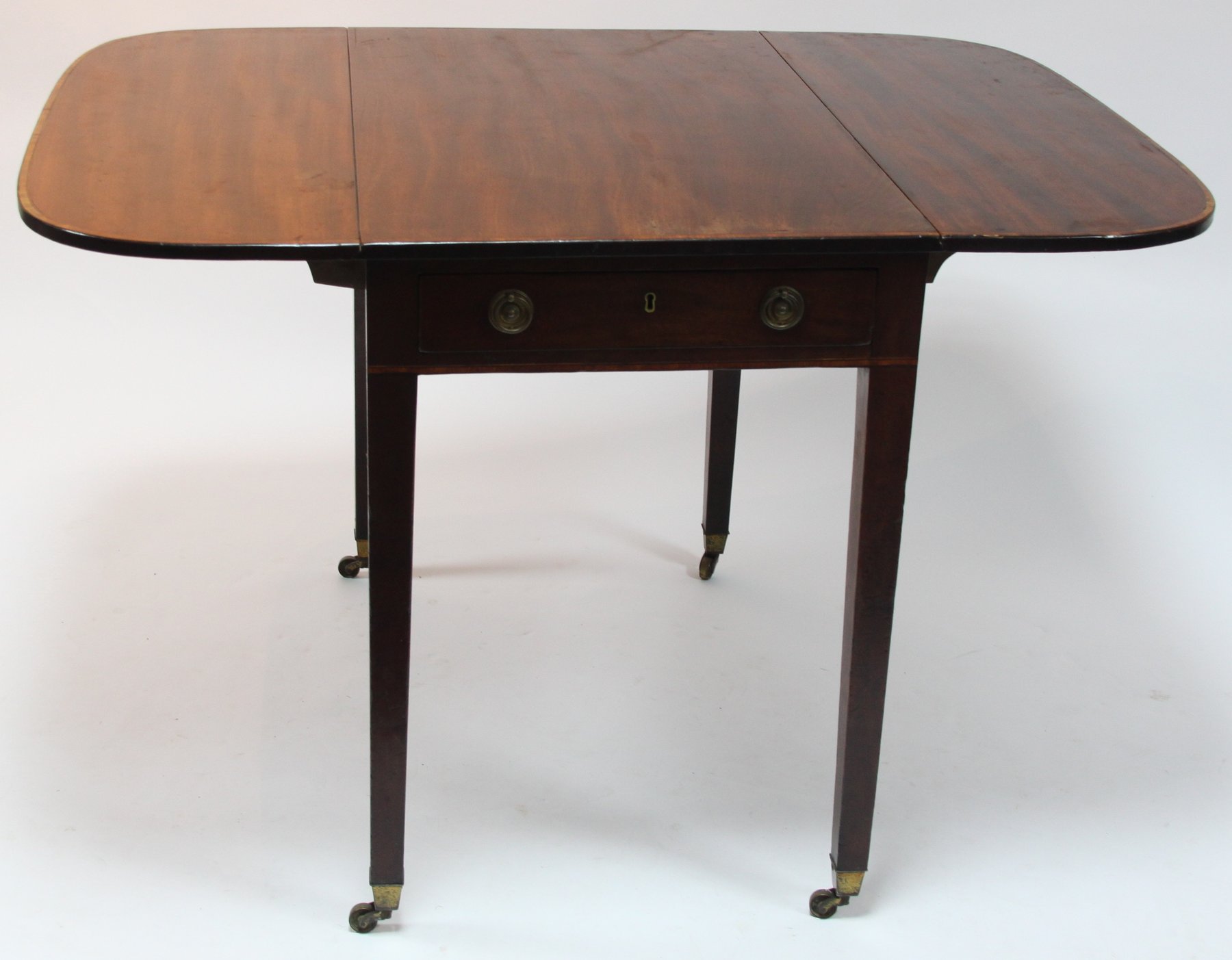 Appraisal: A th Century mahogany Pembroke table fitted a single drawer