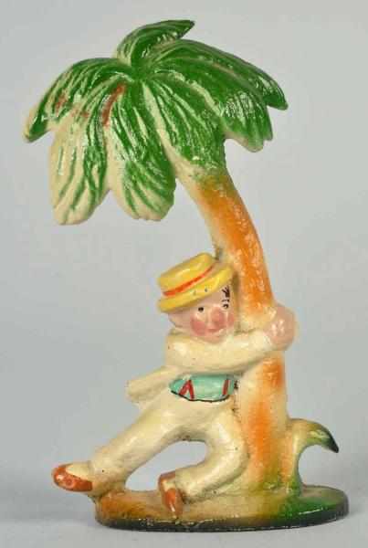 Appraisal: Cast Iron Drunk Holding Palm Tree Bottle Opener John Wright