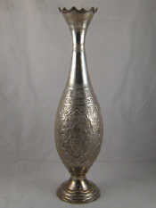 Appraisal: A tall Persian standard silver baluster vase with embossed and